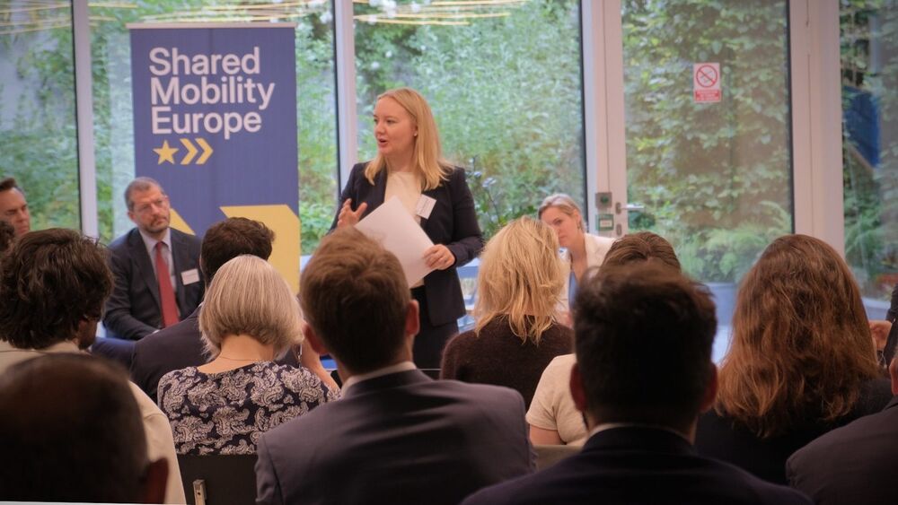 A speaker addressing the Shared Mobility Europe launch